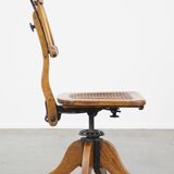 Antique late 19th century English office chair with reclining backrest and height adjustable