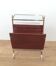 Neoclassical magazine rack in mahogany and brass
