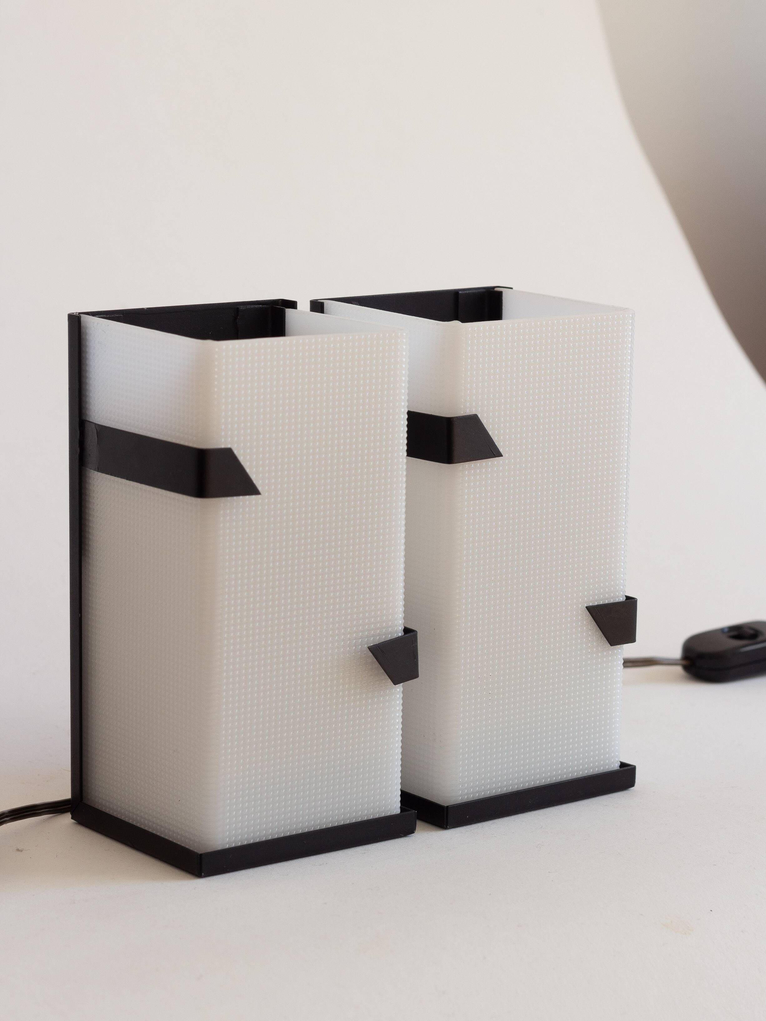 Pair of modernist metal wall lights with perspex diffuser, 1950s/1960s