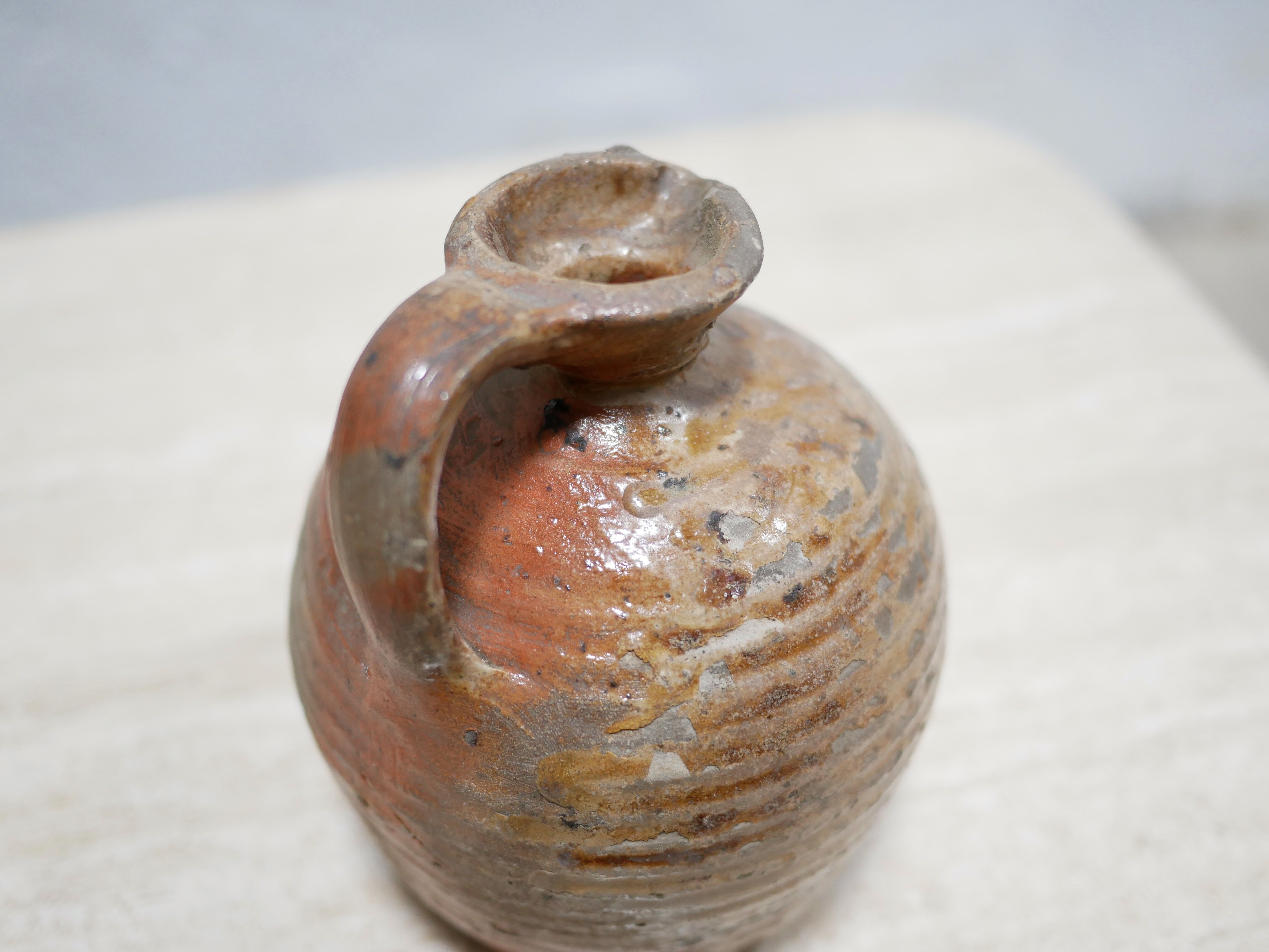 Old glazed terracotta jar