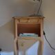 Wood and pink bedside table