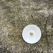 Old industrial black and white vintage enameled sheet metal pendant light