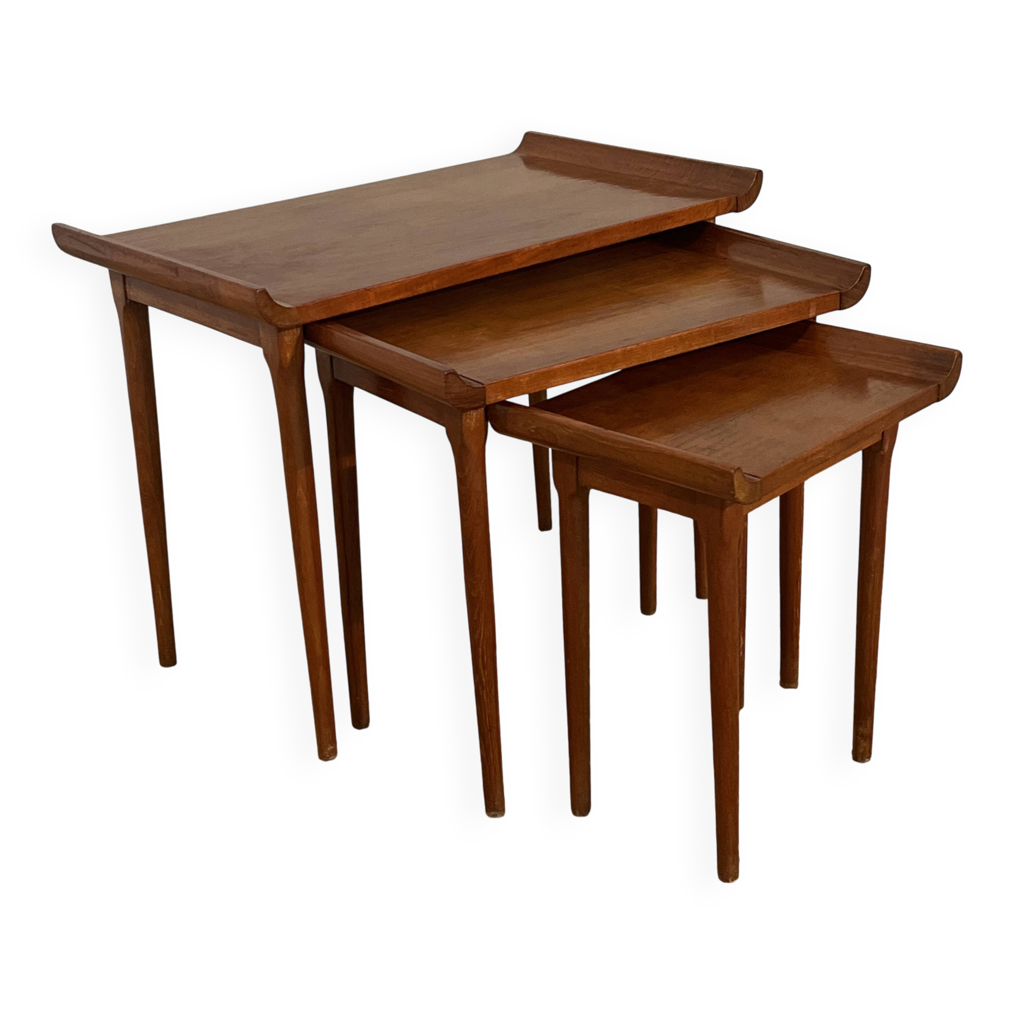 Set of three nesting low tables in a Japanese style, made of mahogany.