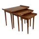 Set of three nesting low tables in a Japanese style, made of mahogany.