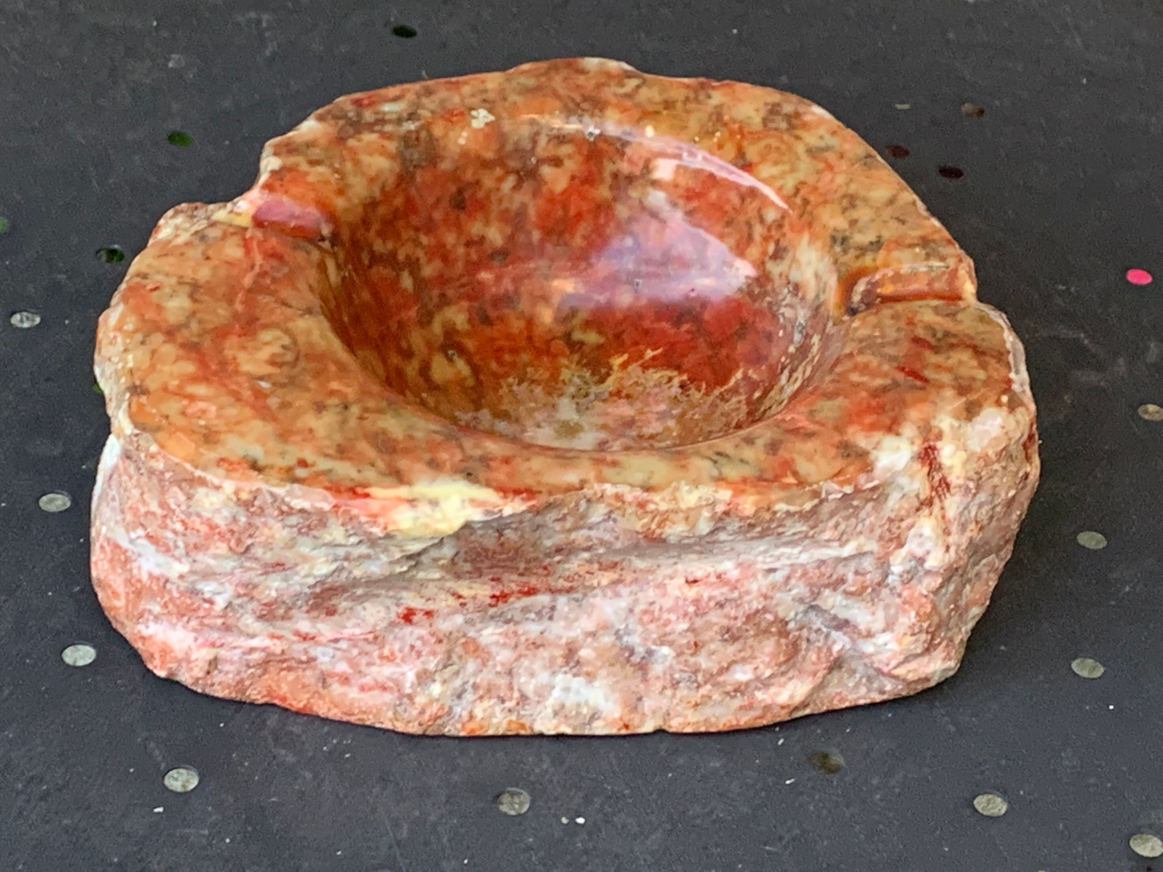 Ashtray in marble stone of vintage cherry color