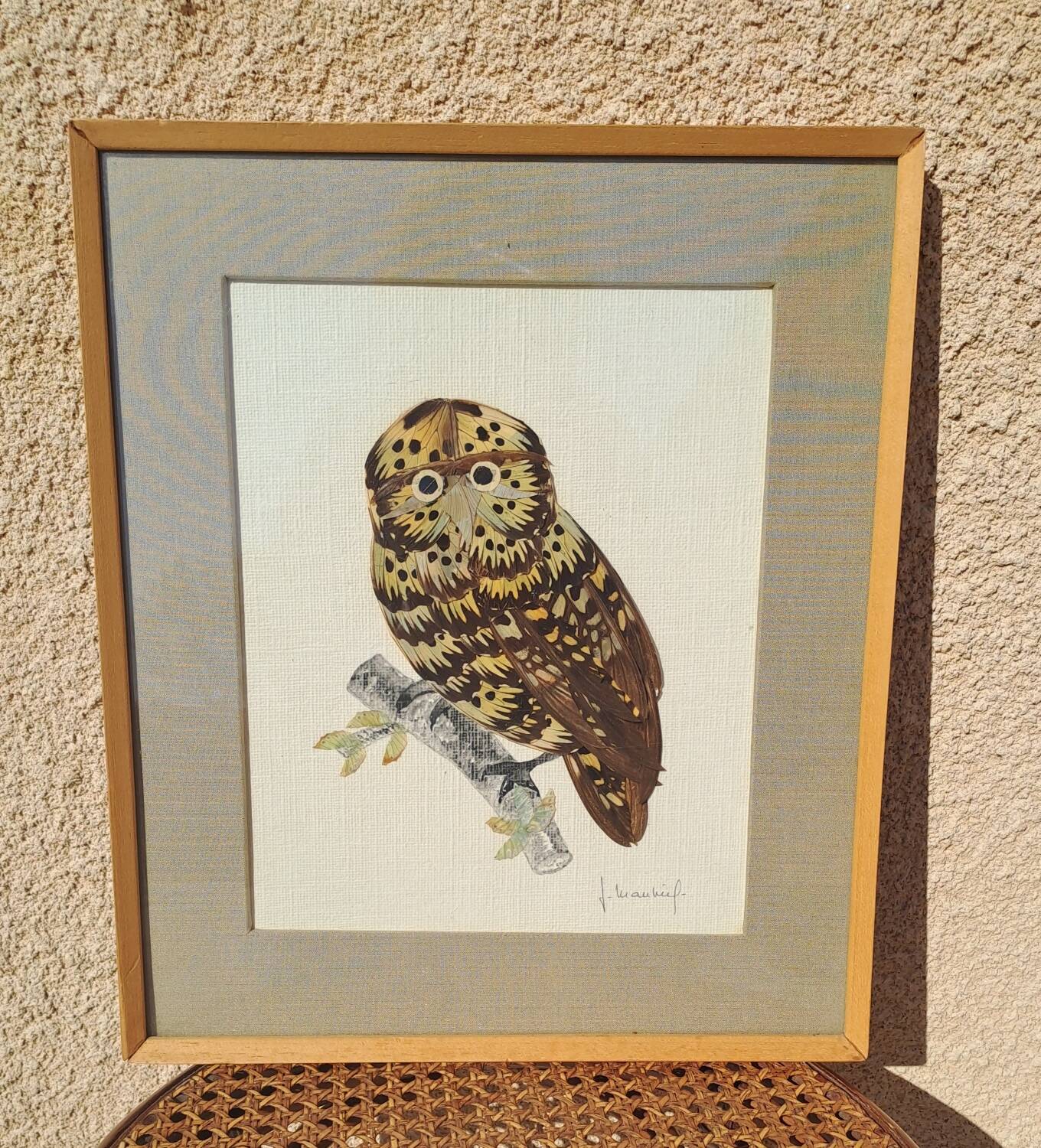 Framed tableau under glass, owl with butterfly wings.