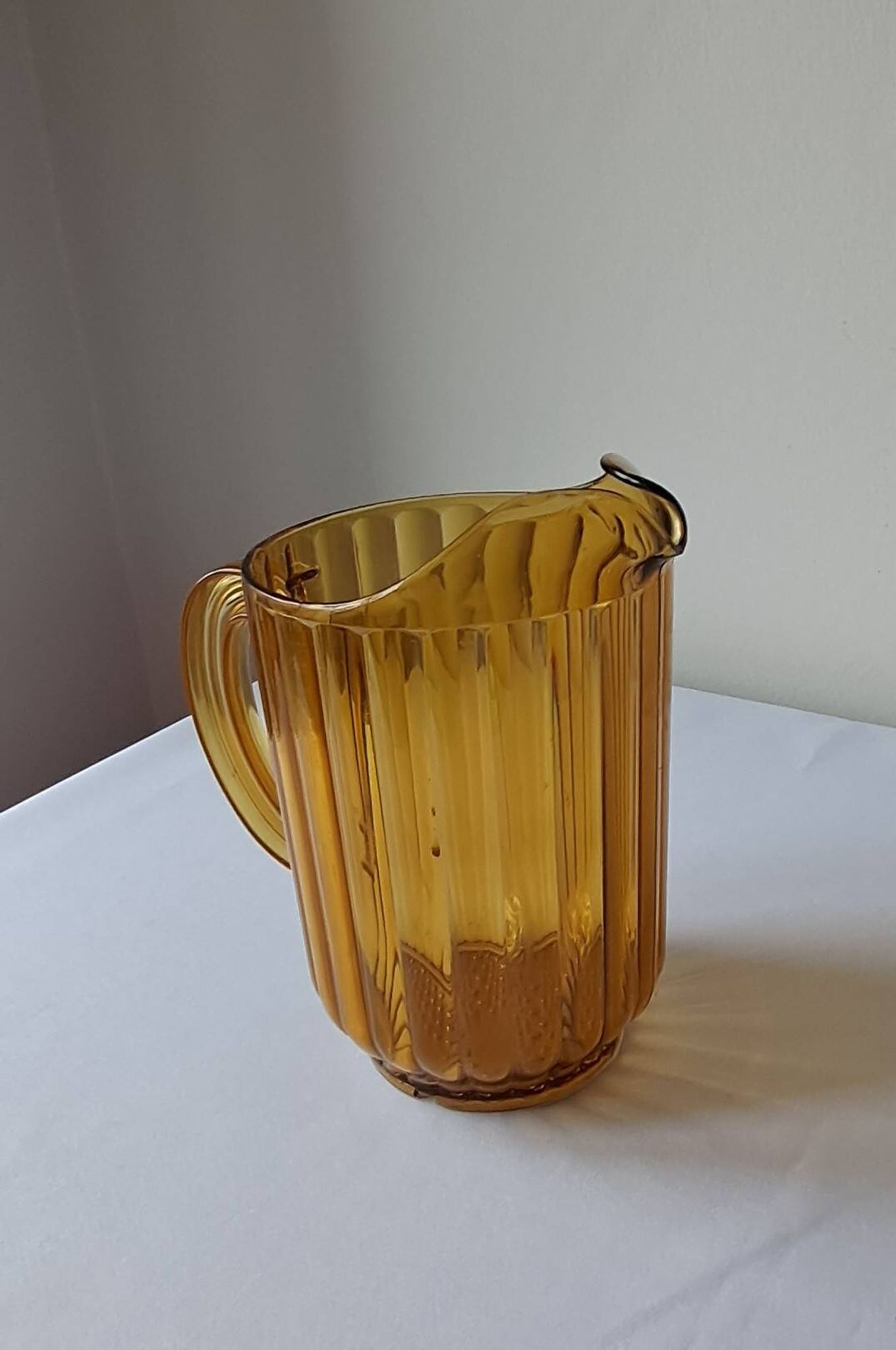 Vintage amber polycarbonate jug