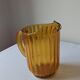 Amber polycarbonate jug. Vintage