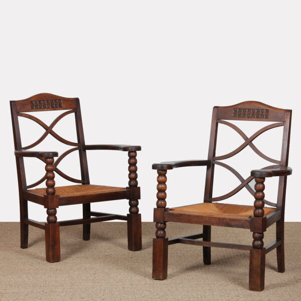 Pair of armchairs in the style of Charles Dudouyt, 1950.