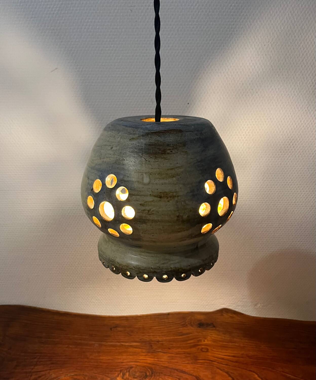 Ceramic suspension with openings