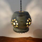 Ceramic suspension with openings