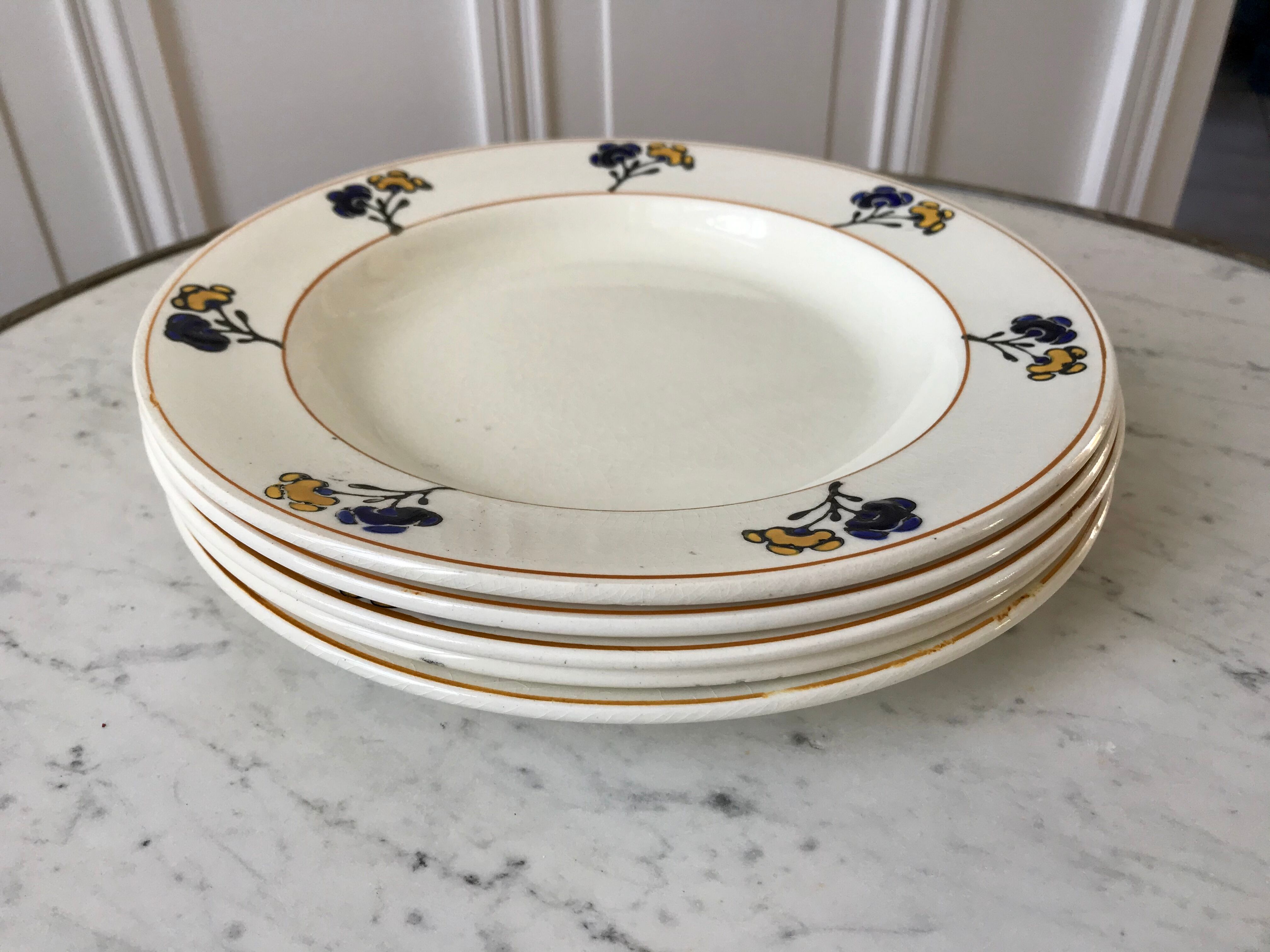 Set of 5 hollow plates Iron Earth model "Romeo" early XXth