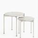 Round tables, side tables, coffee tables in marble and steel.