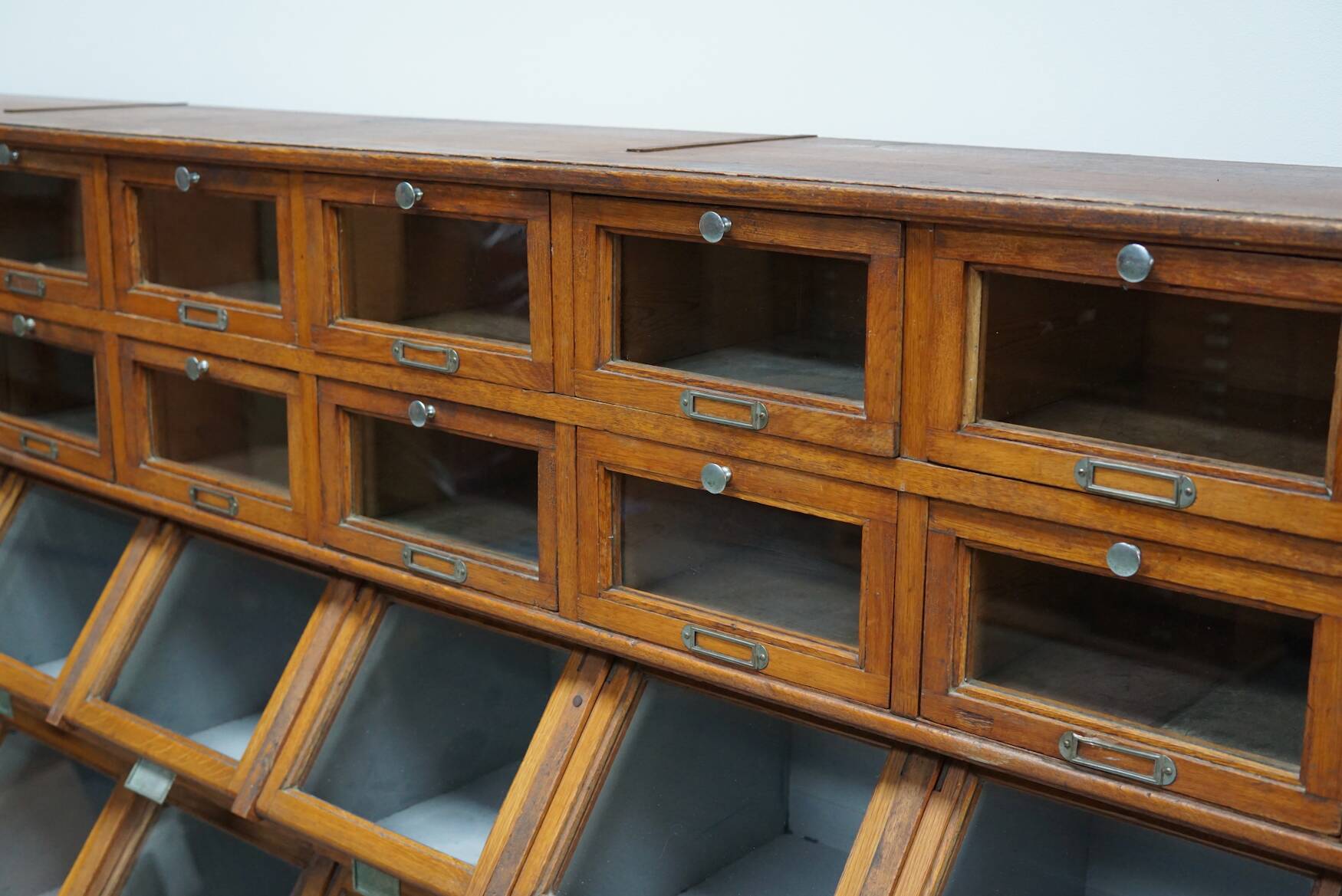 Very large Dutch oak showcase for grocery or haberdashery, 1920s-1930s