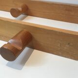 Charlotte Perriand, pair of fir wall coat racks, French work, around 1970