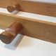 Charlotte Perriand, pair of fir wall coat racks, French work, around 1970