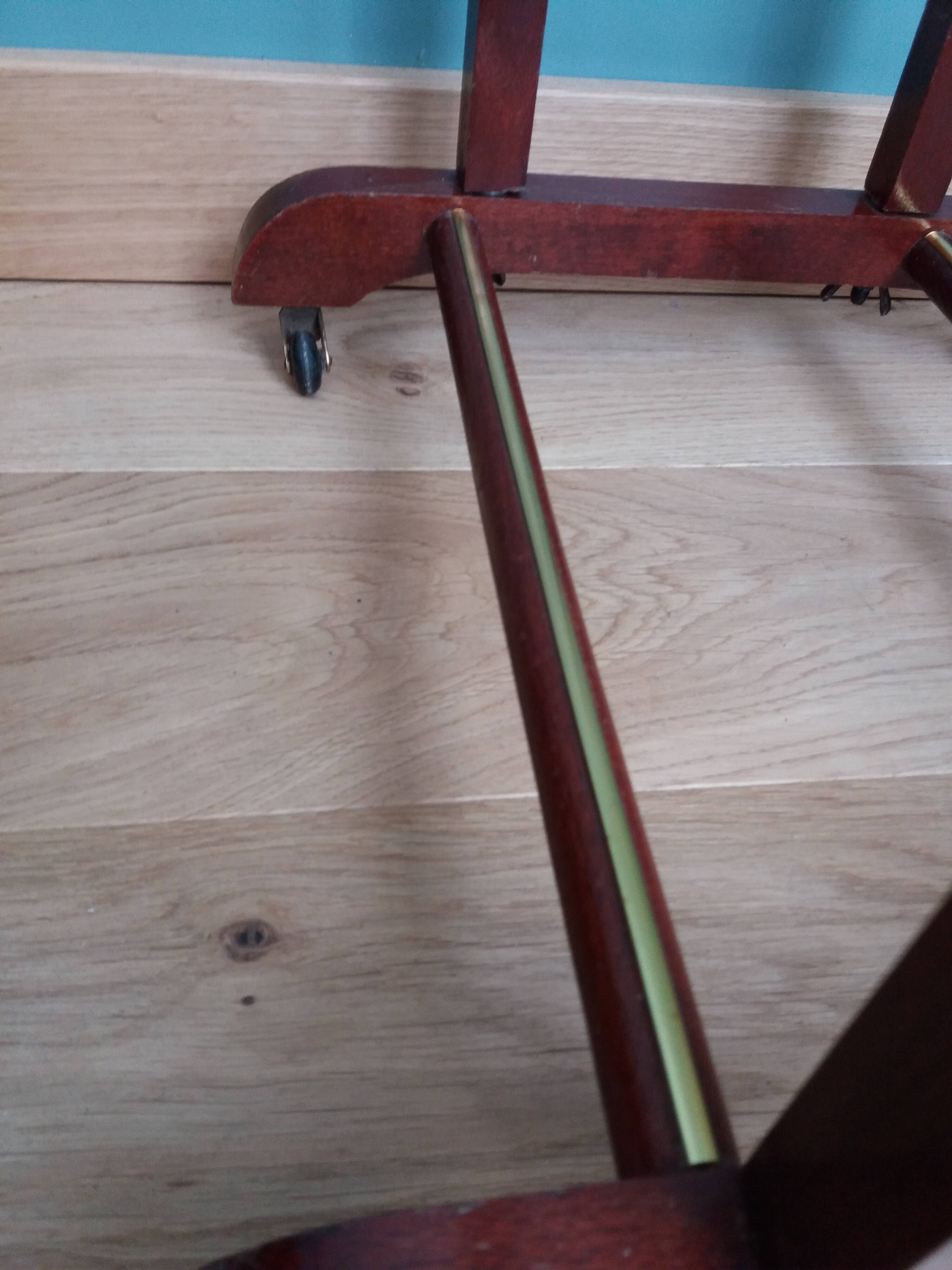 Night stand with two clothes racks