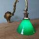 Wall light in bronze art nouveau with green opaline lampshades.