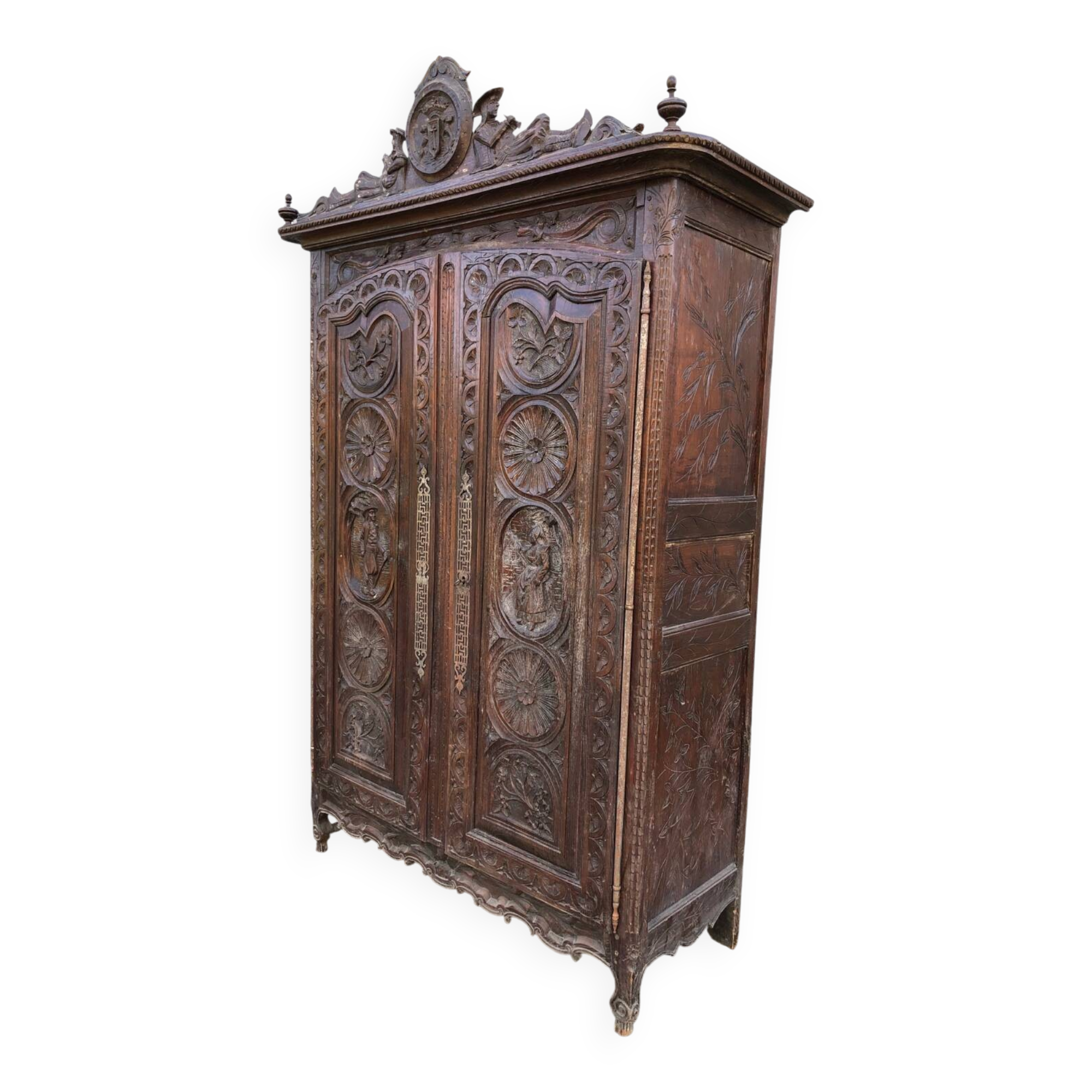 Antique Breton oak cabinet, richly carved