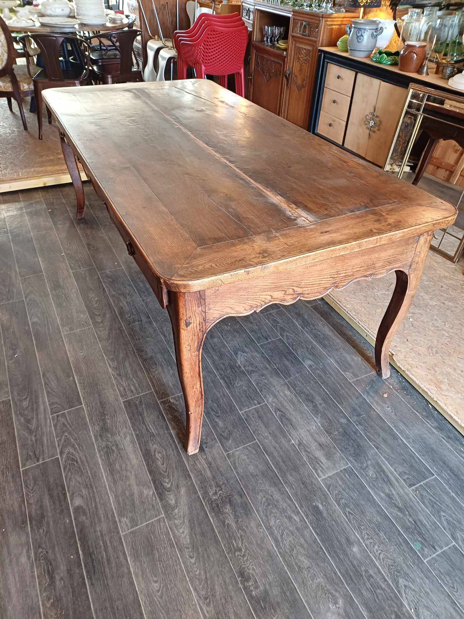 19th century farm table with 2 drawers 208 long 100 wide 75 high