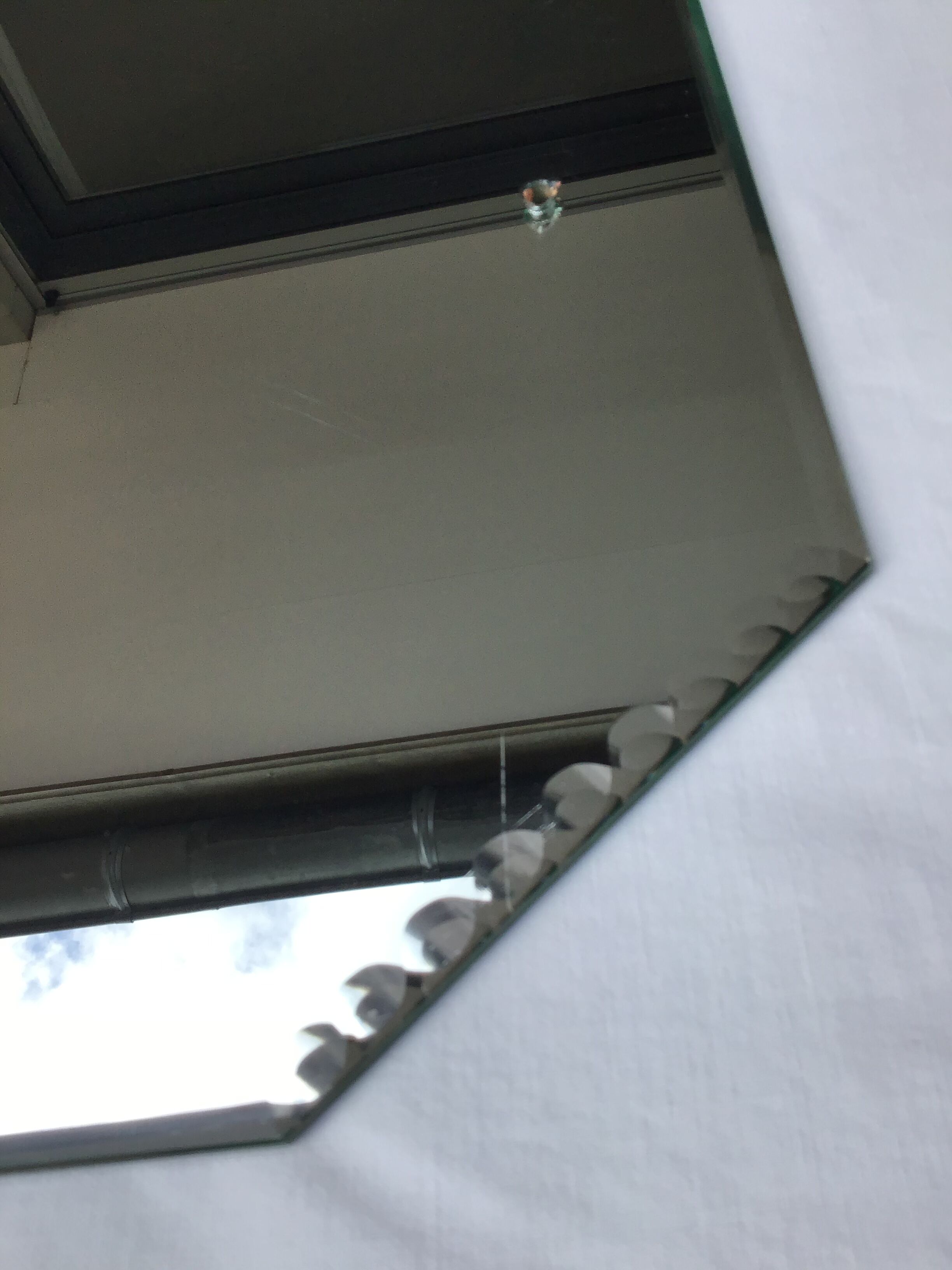 Octagonal bevelled mirror 1930 - 33x60cm