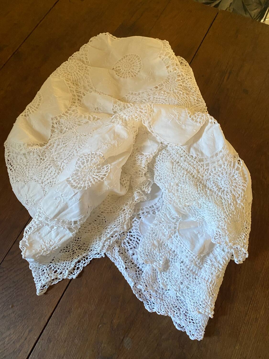 White cotton tablecloth with crochet lace.