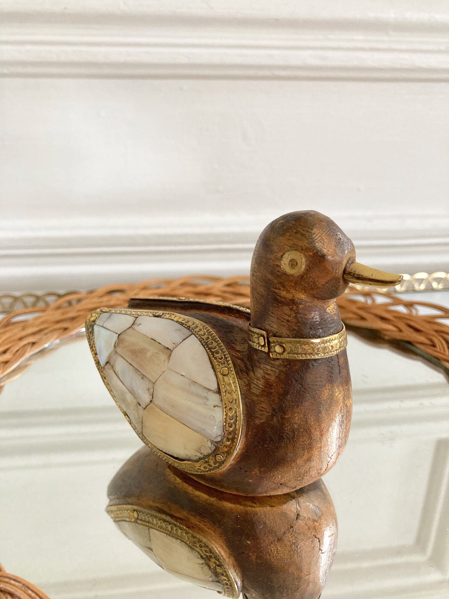 Wood brass duck and mother-of-pearl