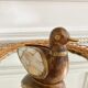 Wood brass duck and mother-of-pearl