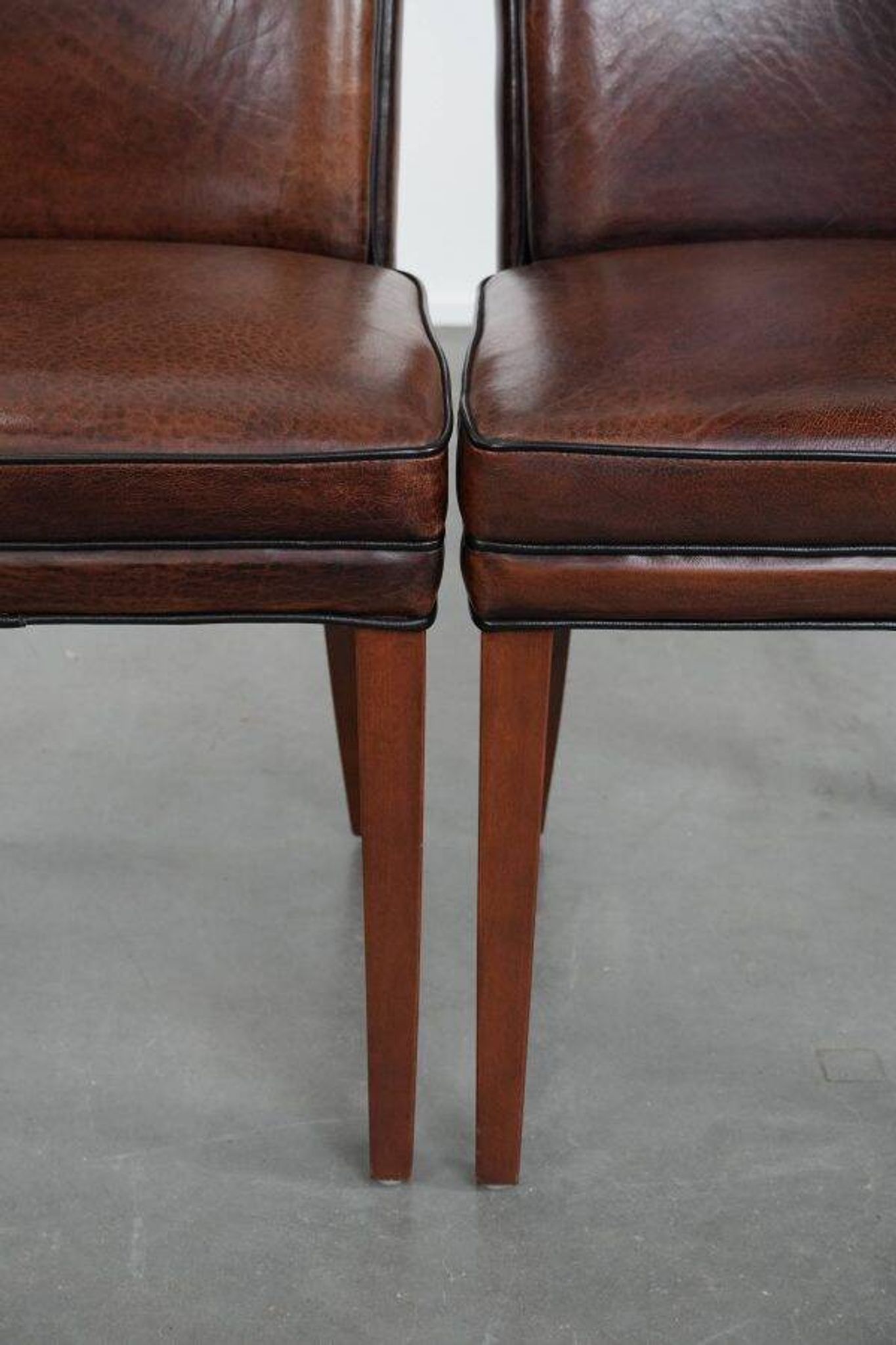 Comfortable set of 2 sheep leather dining chairs with character