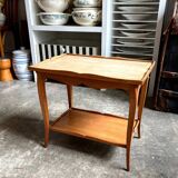Coffee table, side table in light wood with saber legs.