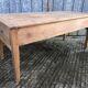 Antique solid cherry farmhouse table with 3 drawers and 1 pull out.
