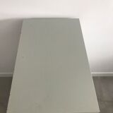 Three-drawer industrial grey metal filing cabinet with hanging backs