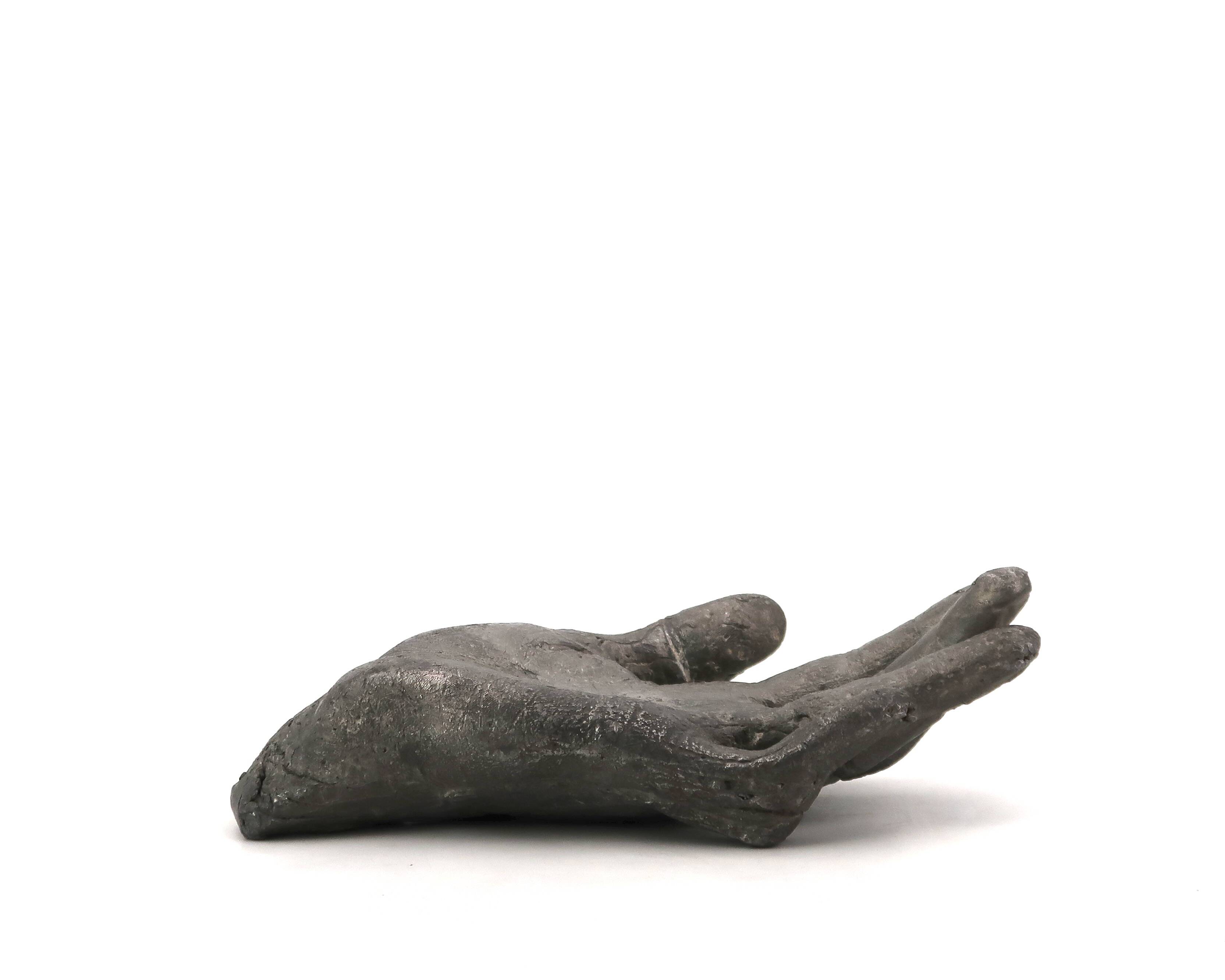 Cast iron silver-coloured catchall in the shape of a hand, 1970s sculpture.