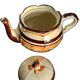 Old porcelain teapot from Pornic around 1950.