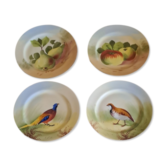 Lot de 4 assiettes motifs "faune et flore" de la marque Limoges, France