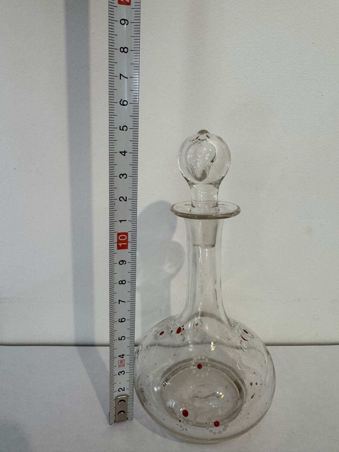 Antique blown glass carafe, enamelled with floral decoration, in the style of Legras.