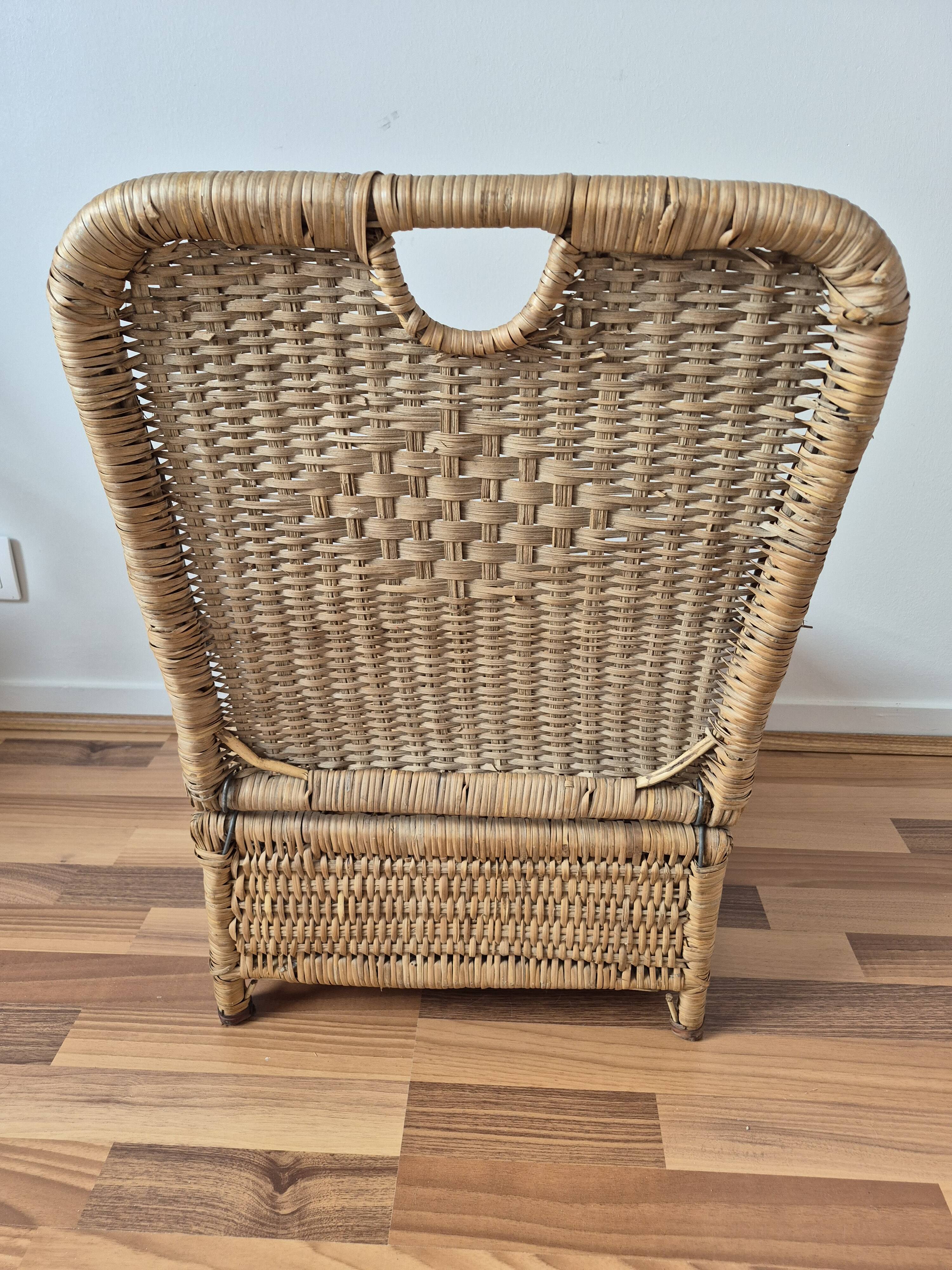 Vintage foldable beach chair, picnic in rattan and leather.