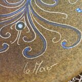 Ceramic pocket tray or tray with enameled relief decoration. Signed Le Mao (above and below)