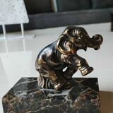 Art Deco Elephant Bookends. In regula on a black veined marble base. Rare model