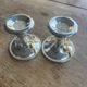 2 silver-plated candlesticks
