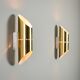Pair of cylindrical wall lamps in brass with perforated shades