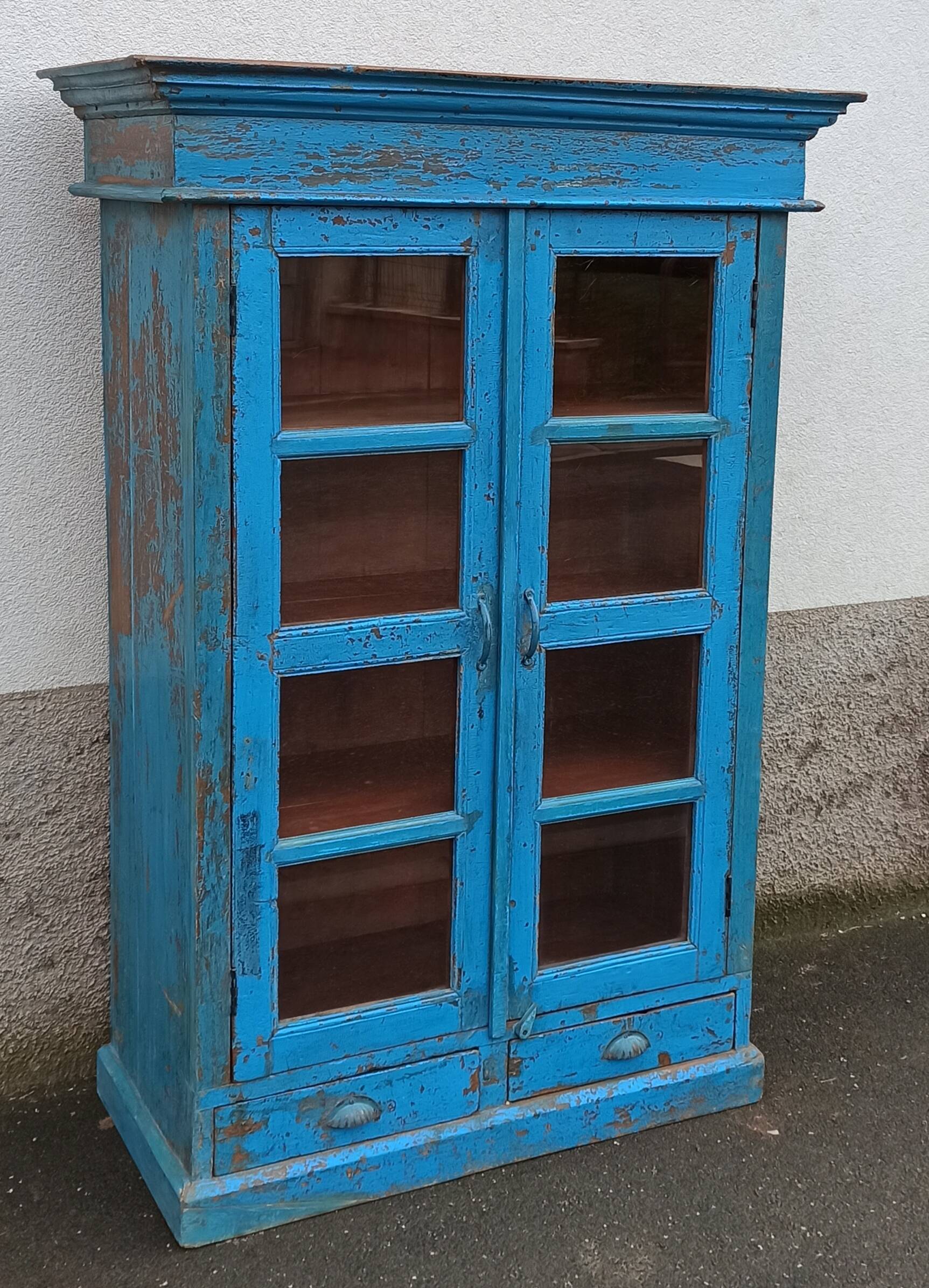 Old wooden glazed cabinet with two doors and two drawers