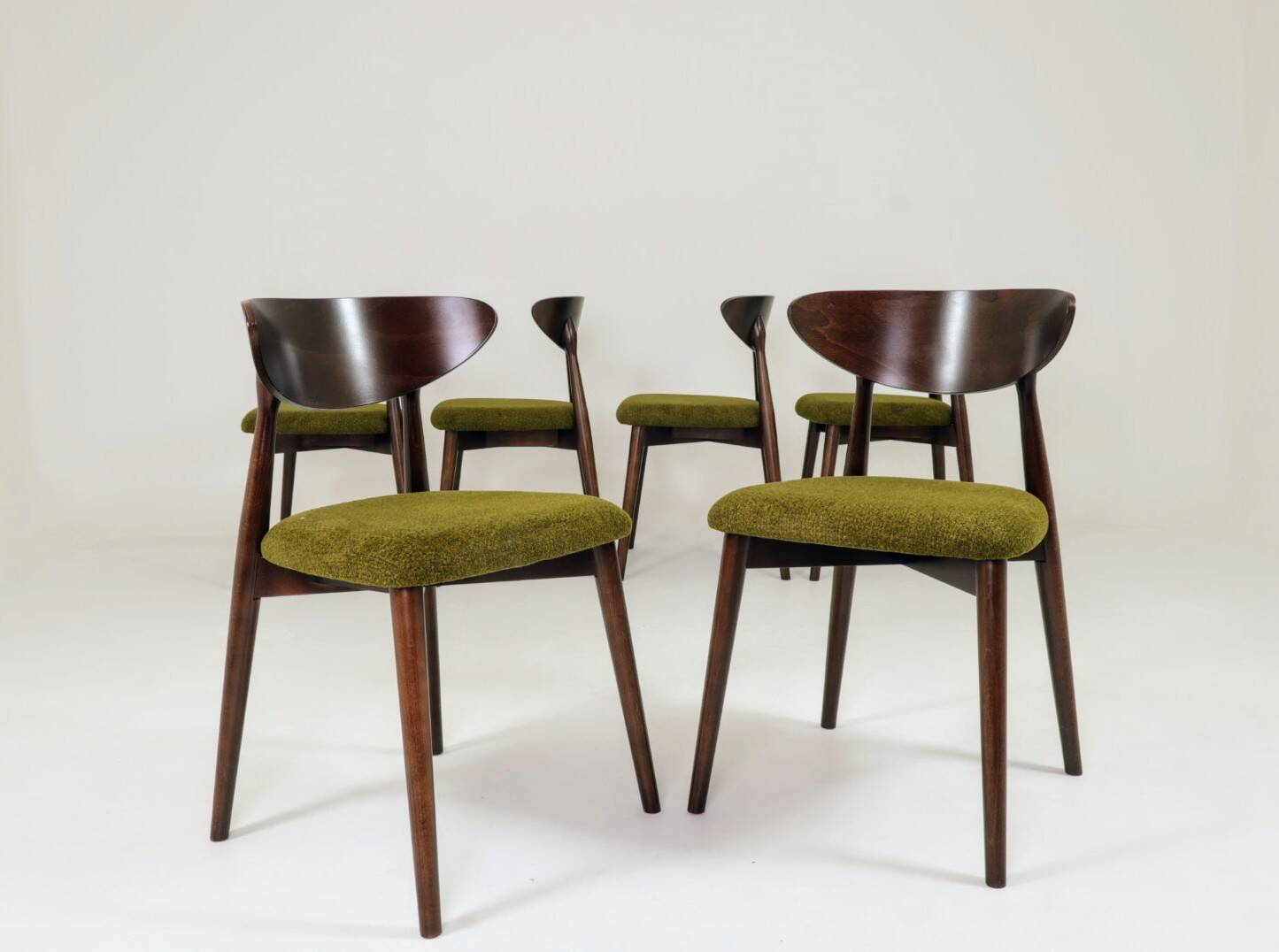 Scandinavian dining chairs set of 10 in sauvage green bouclé.
