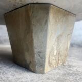 Light gray solid granite coffee table with organic triangular shape and conical base, 1980s