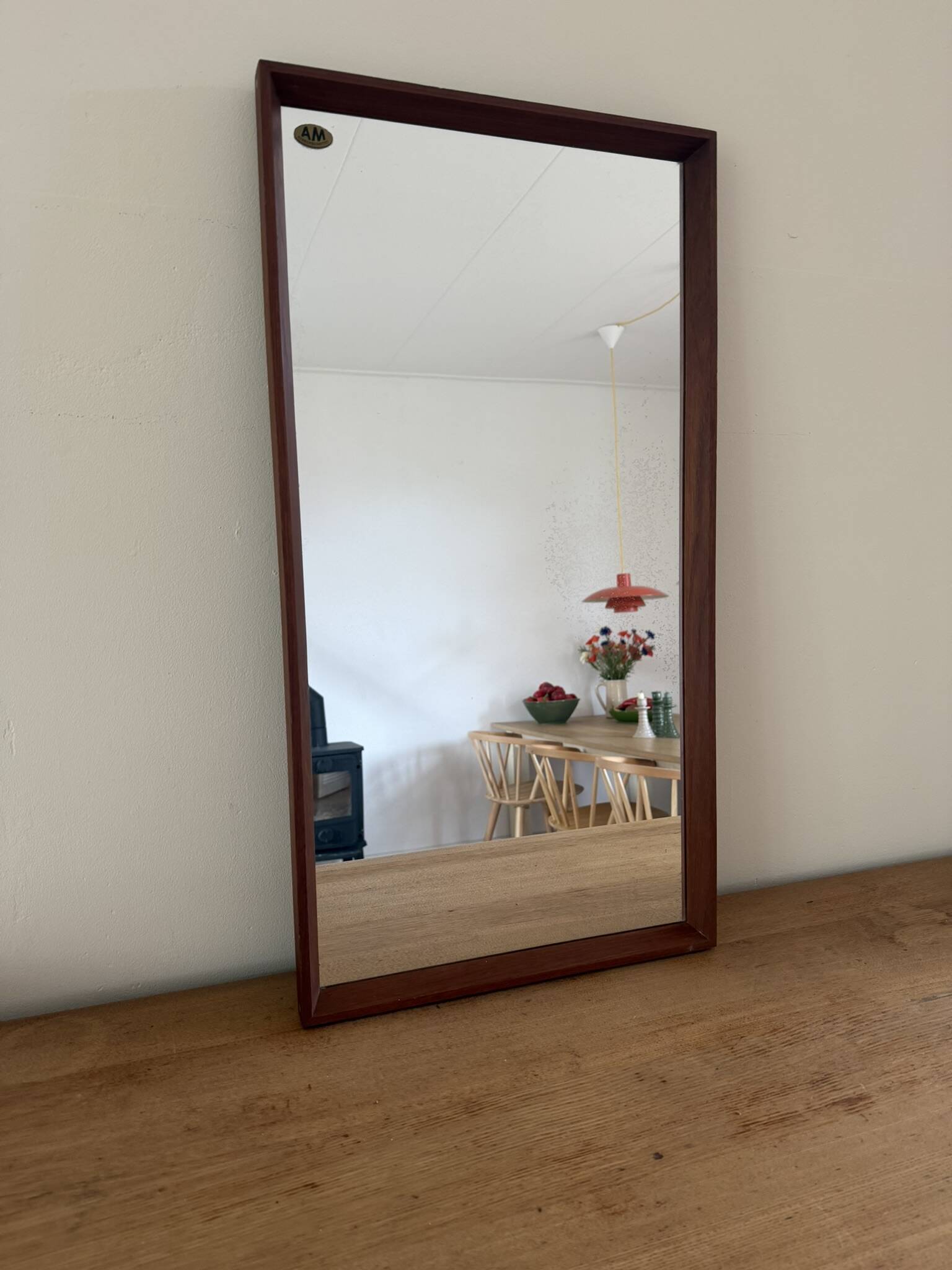 Beautiful vintage Danish teak mirror with mittered edges and nice brass det