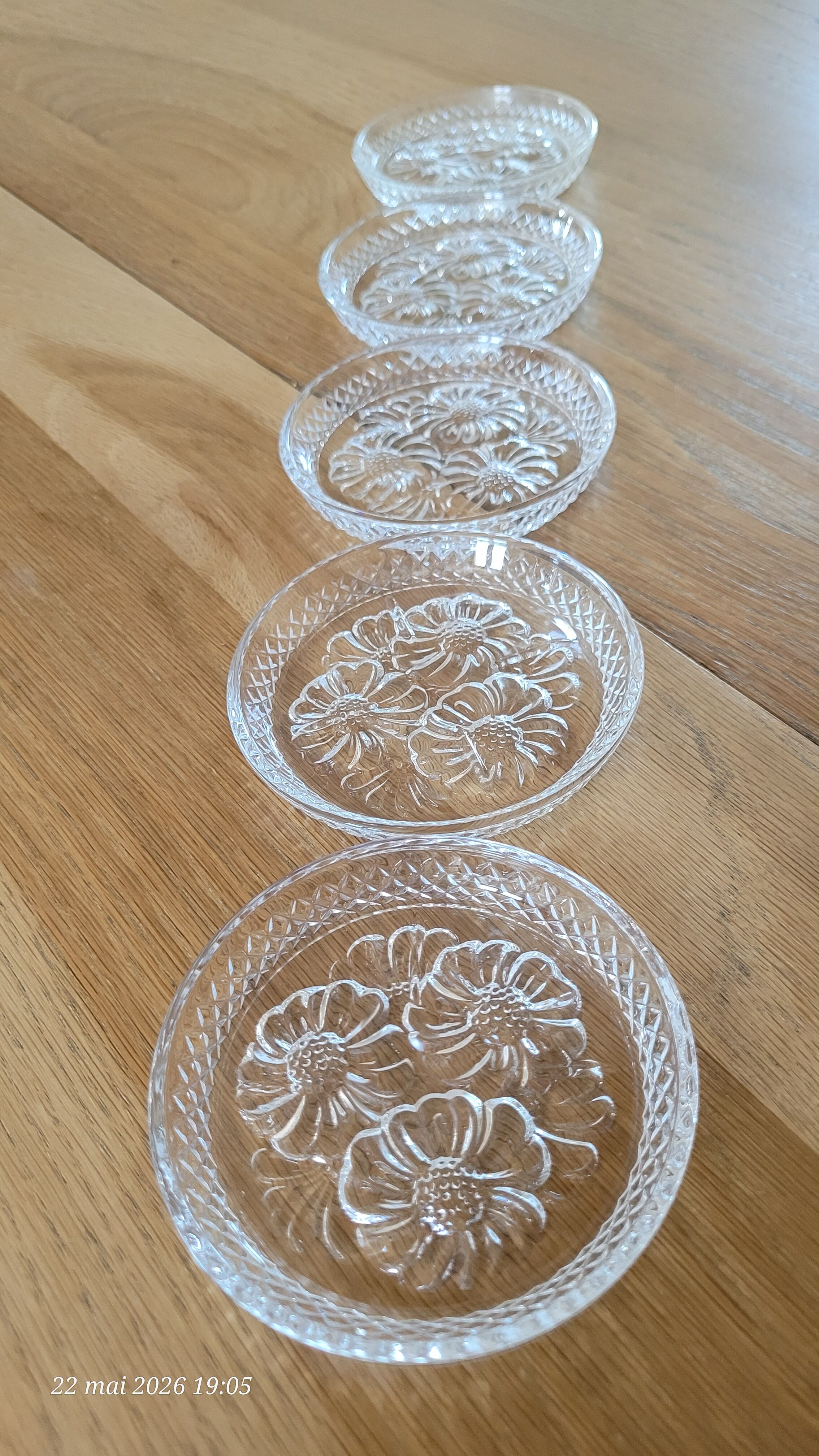 5 transparent glass coasters