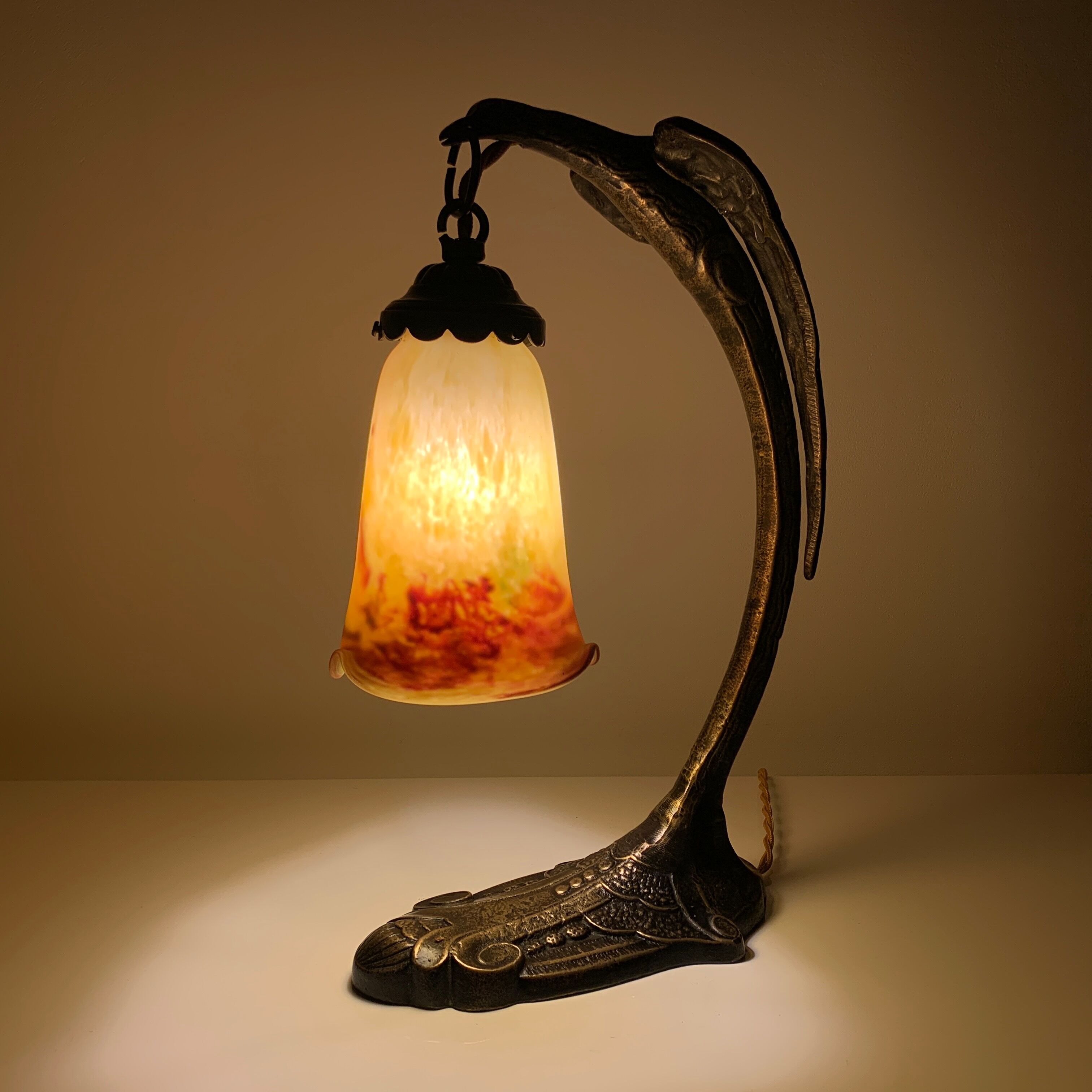 Bronze eagle lamp patinated and Art Nouveau style glass pate
