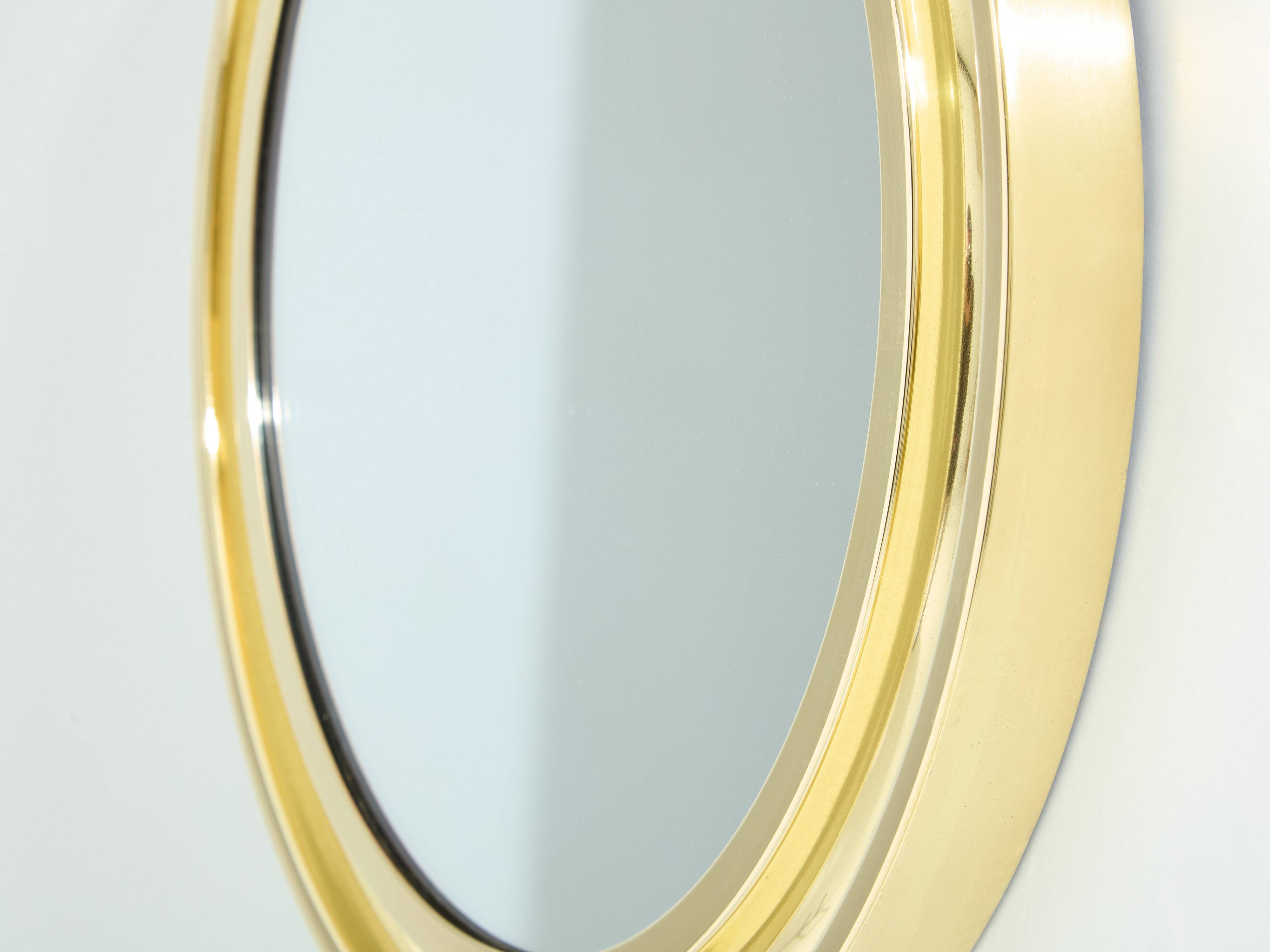 Round brass mirror by Sergio Mazza for Artemide 1960s