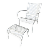 Metal garden chair and its footrest.