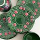 3 earthenware cups and saucers in barbotine fruit decor Salins vintage